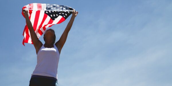 woman holding american flag
